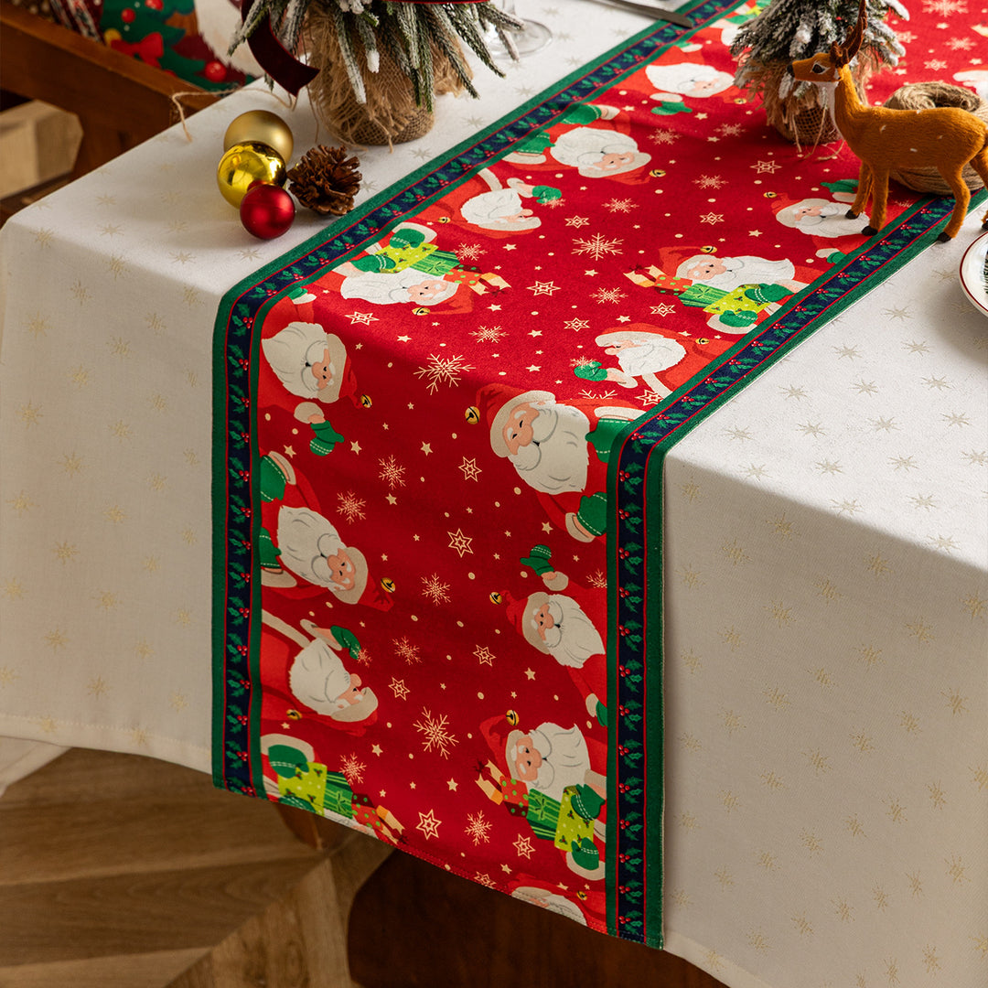 Table runner made of cotton blend fabric with a Christmas reindeer and star motif Kalsten