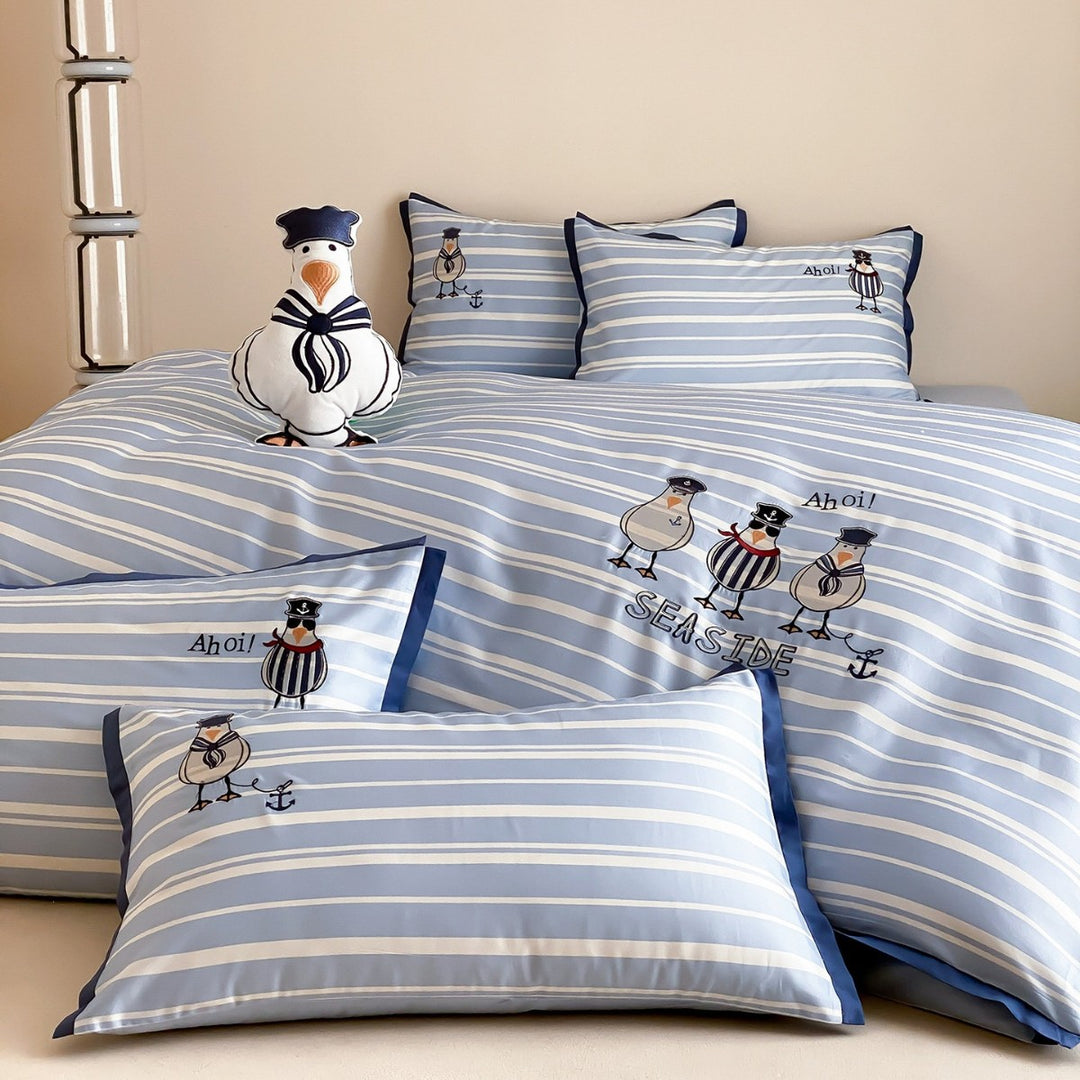 Maritime cotton satin bedding set with embroidered seagull motifs and fine stripe pattern