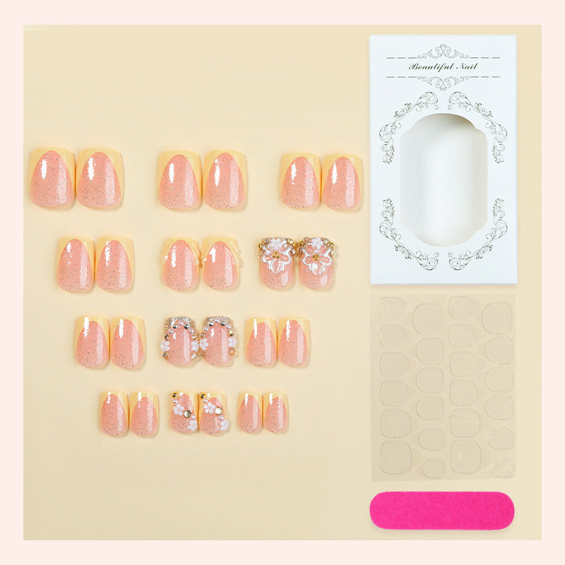 Nail art set with glamorous glitter and flower accents Kalsten