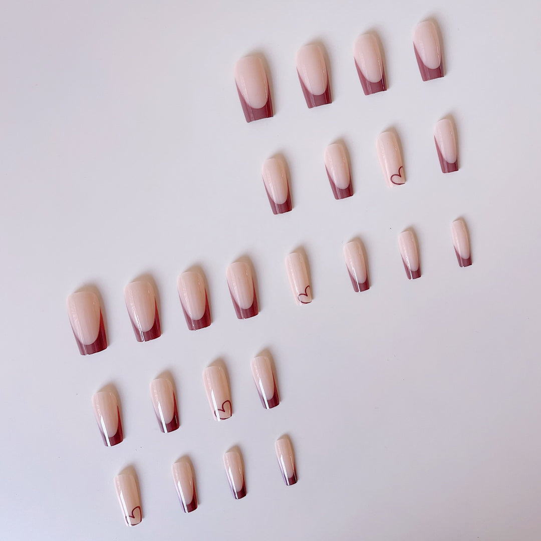 Glamorous artificial nails with elegant tips and heart design Kalsten