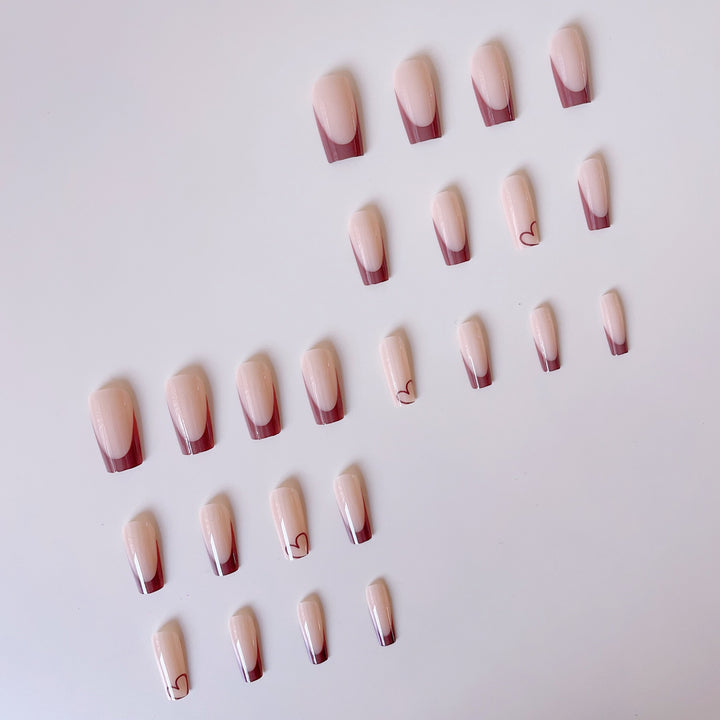 Glamorous artificial nails with elegant tips and heart design Kalsten