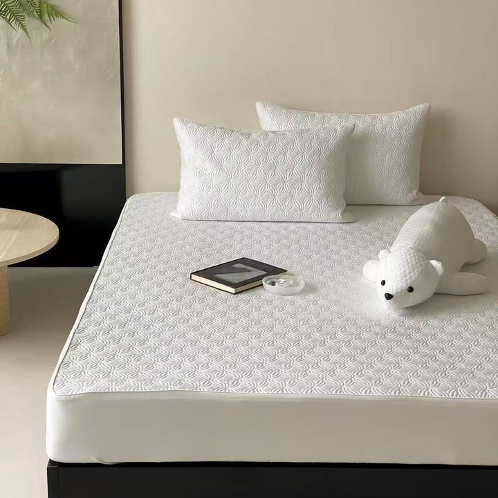 Quilted mattress topper set with non-slip underside, breathable microfiber and pillowcases