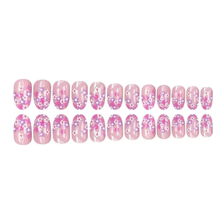 Nail set with floral design and sparkling accents Kalsten