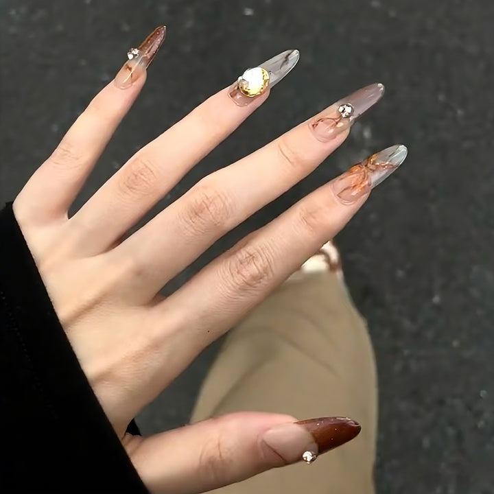 Artificial nails with elegant 3D details and sparkling accents Kalsten