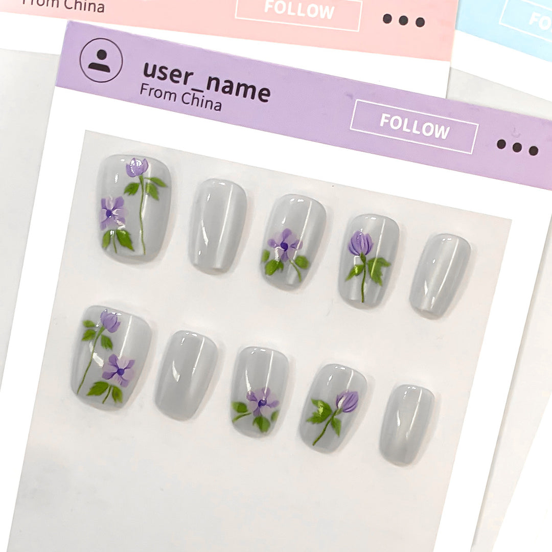 Artistic fingernails with floral accents Kalsten