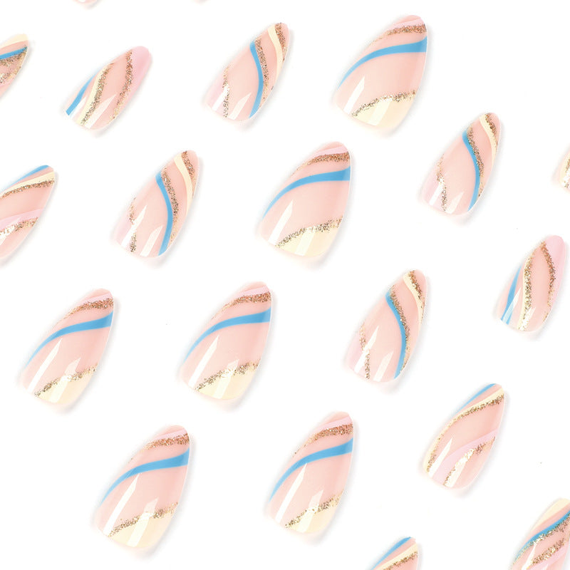 Artistic nail art with metallic accents and abstract designs Kalsten