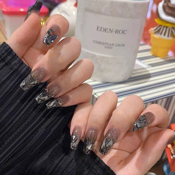 Glamorous artificial nails with moon and star motifs Kalsten