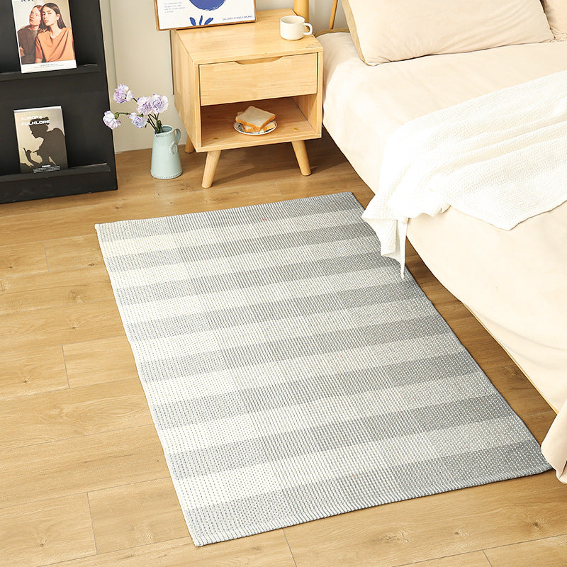 Flat-woven living and bedroom carpet with striped structure and anti-slip backing