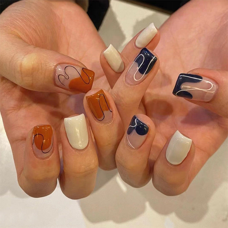 Artful nail extensions with an elegant leaf pattern Kalsten