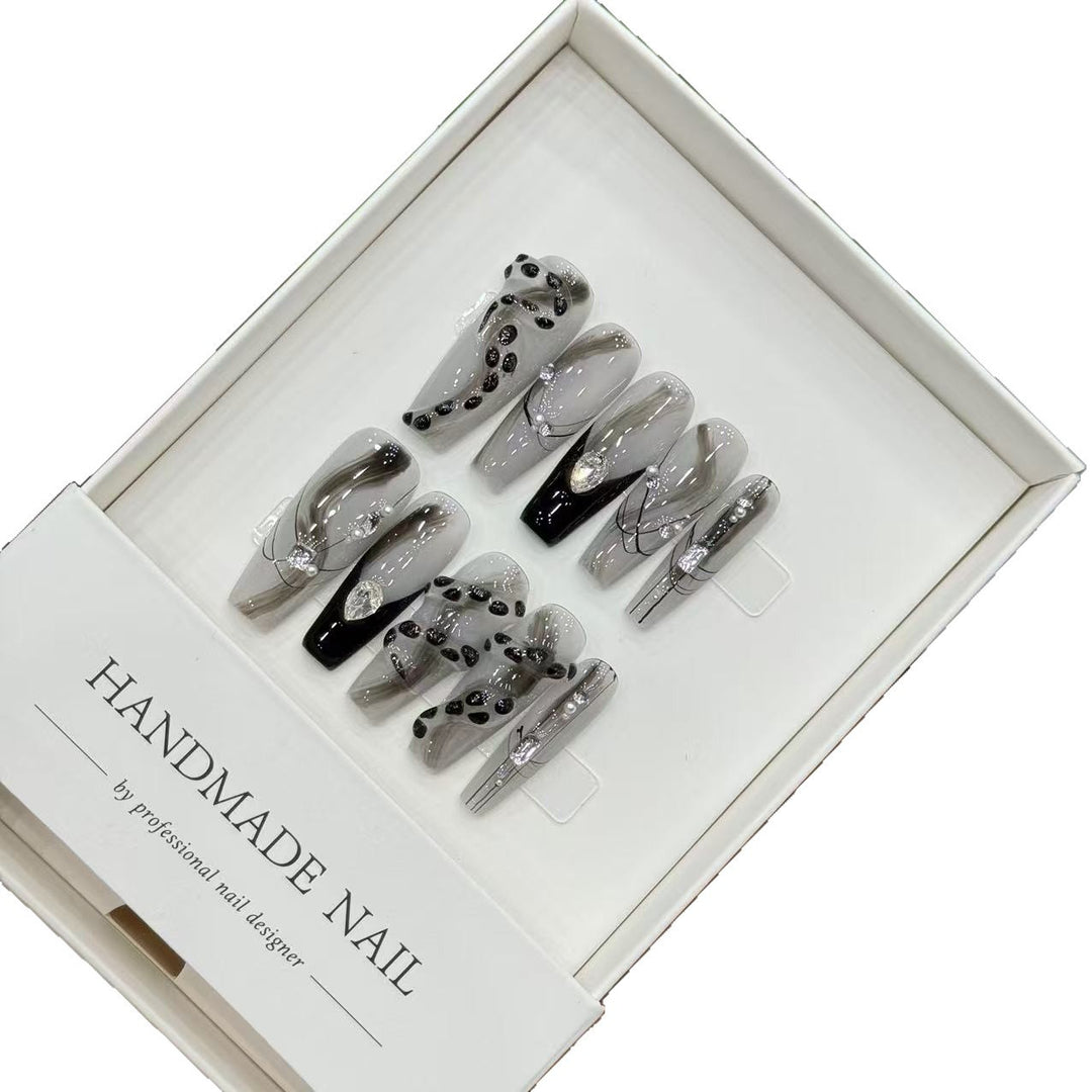 Artistic Press-On Nail Set with Elegant Designs