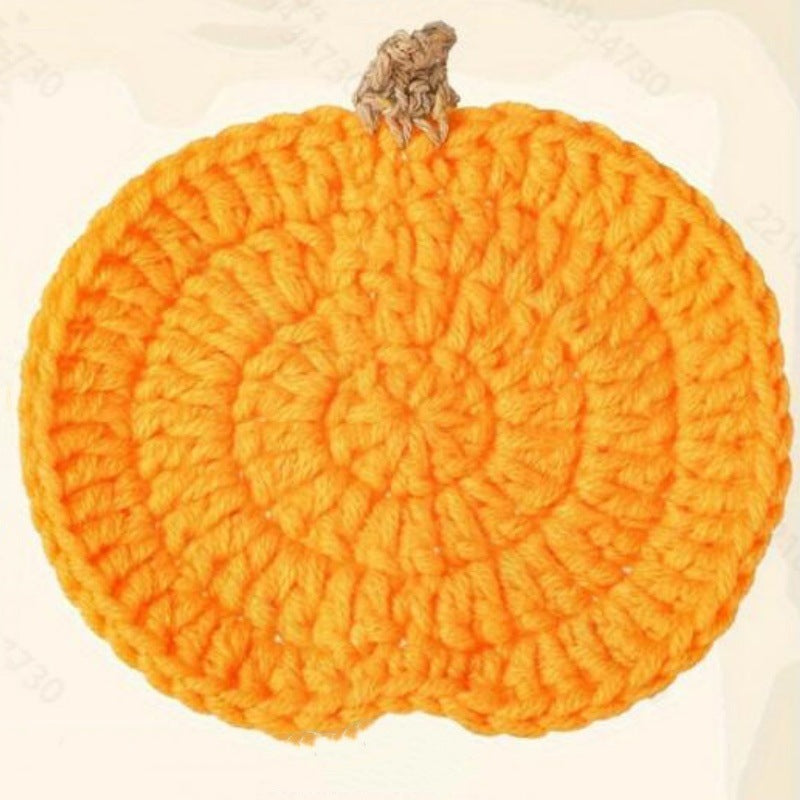 Hand-crocheted pumpkin pot holder and table mat made of cotton yarn