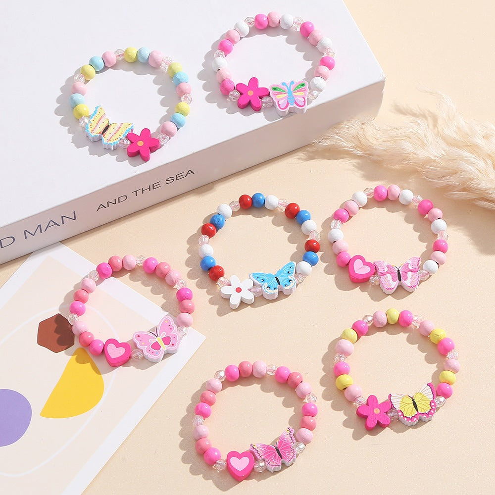 Playful bracelet with heart and butterfly charms Kalsten