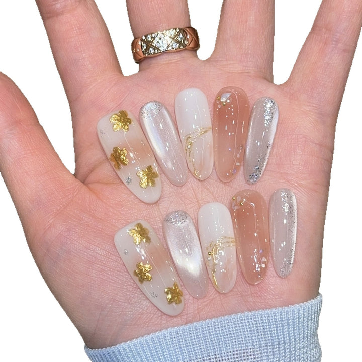 Artificial nails with floral decorations and glitter effects Kalsten