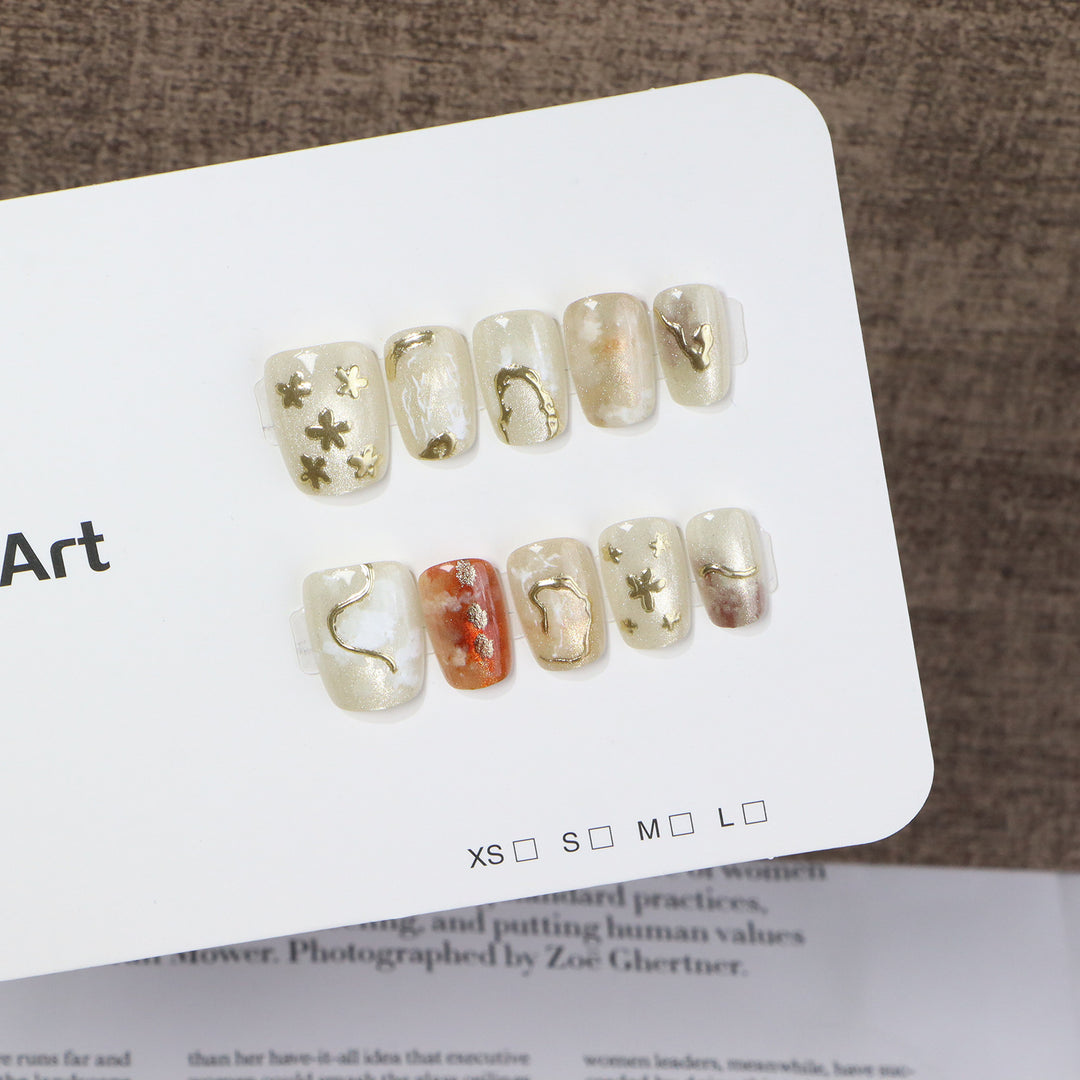 Elegant Press-On Nail Art Set with Unique Metallic Designs Kalsten