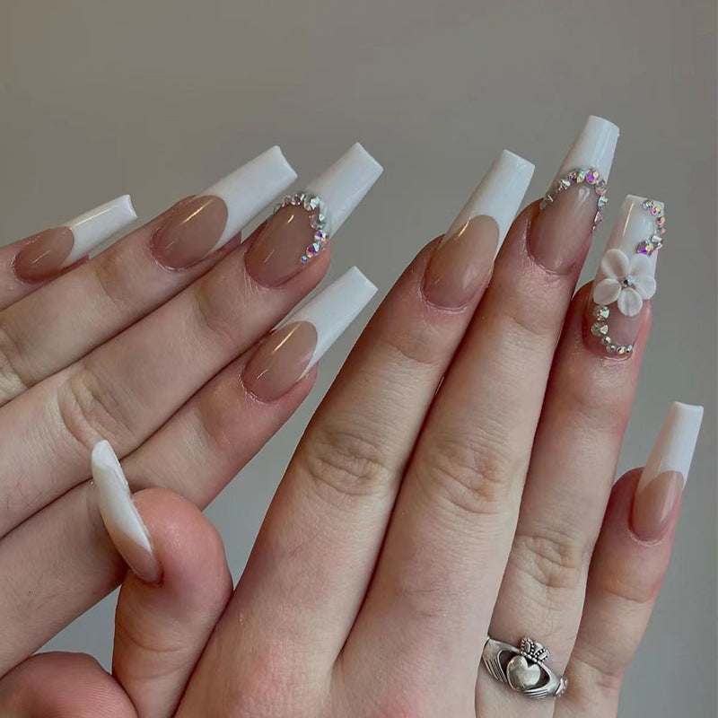Creative artificial nails with elegant rhinestone and floral accents Kalsten