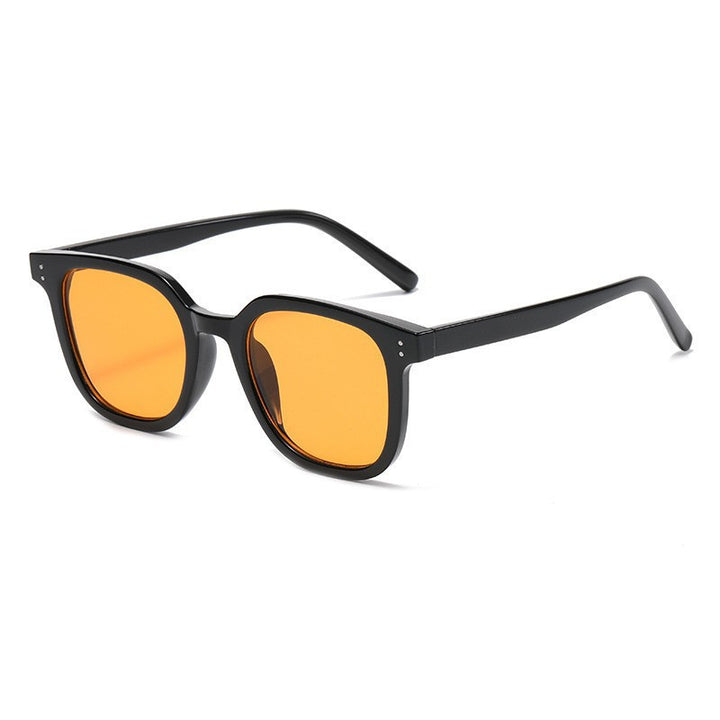 Women striking retro sunglasses with yellow-tinted lenses Kalsten