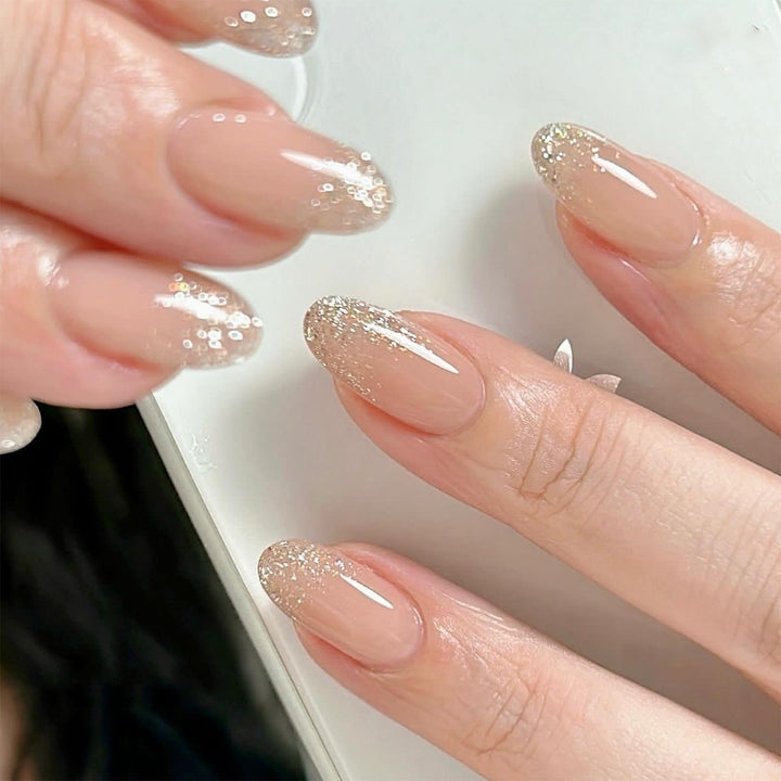 Glittering nail extensions with elegant gradient Kalsten