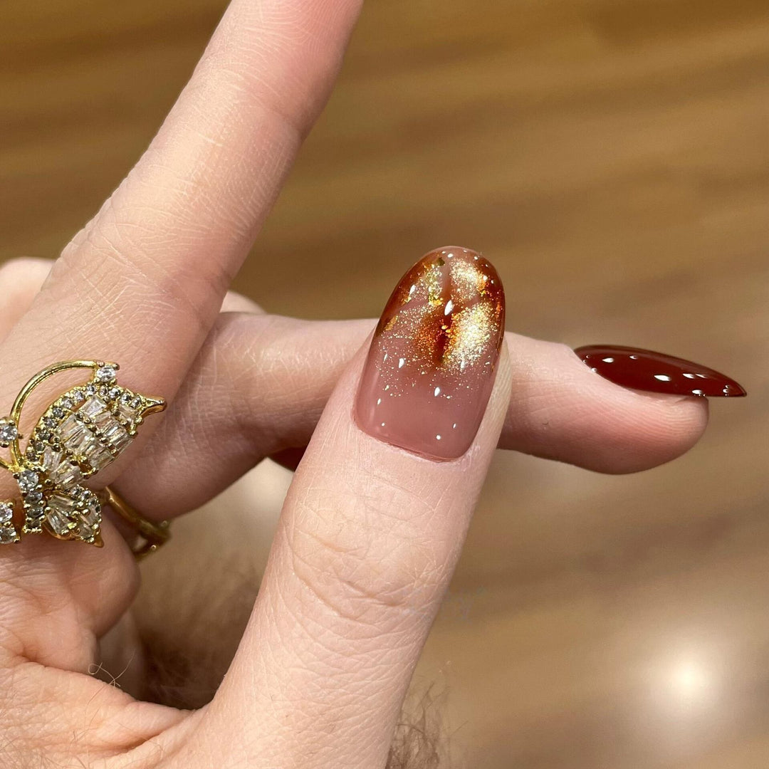 Artificial nail tips with golden accents Kalsten