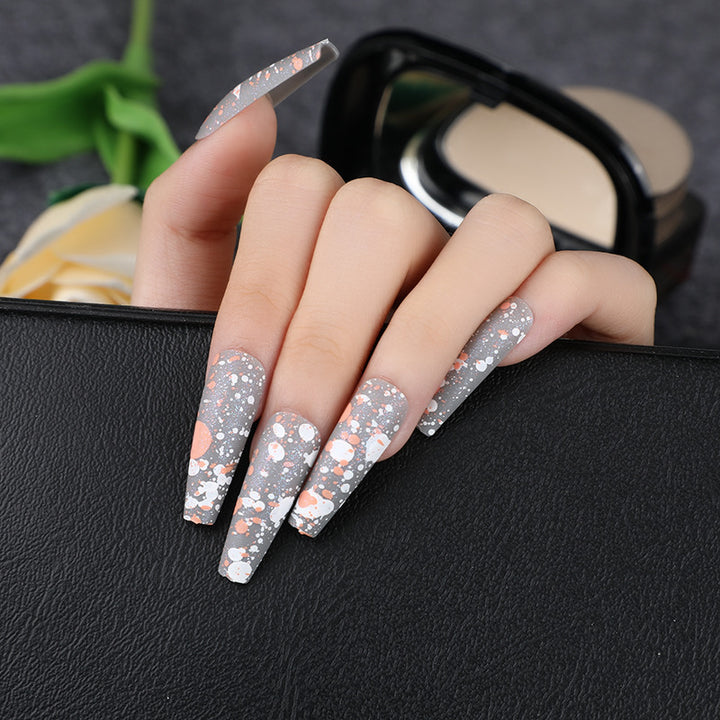 Artistic splatter design artificial nails Kalsten
