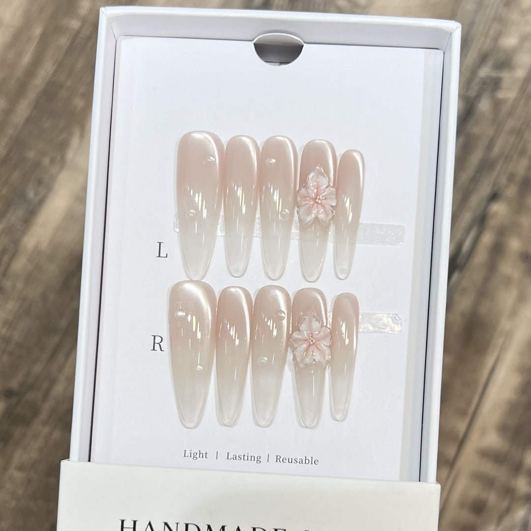 Elegant Stiletto Nail Extensions with Floral Accents Kalsten