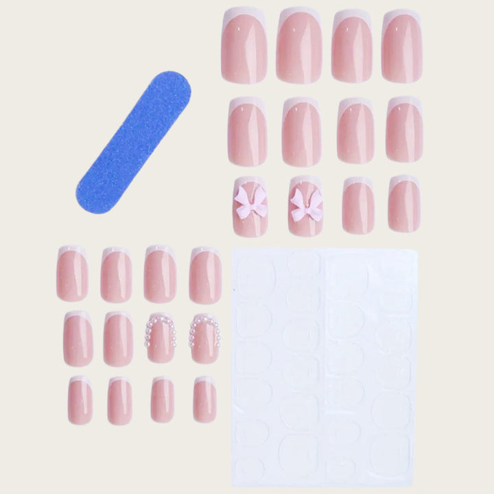 Exclusive artificial nails with decorative bows and pearl details Kalsten