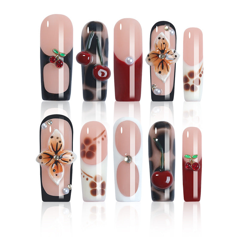 Creative nail art set with floral and fruity accents Kalsten