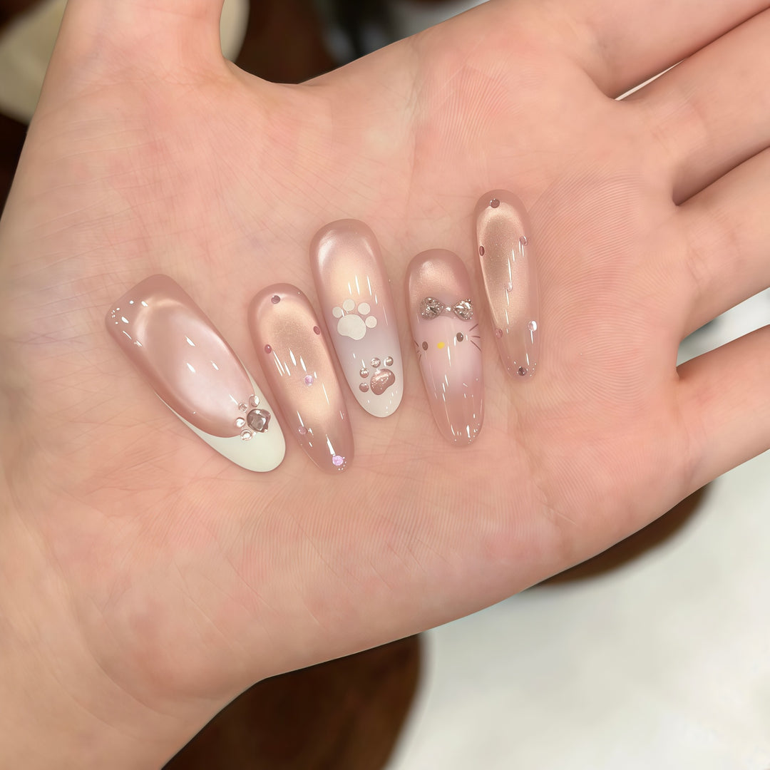 Artificial nail tips with playful penguin and paw print design Kalsten