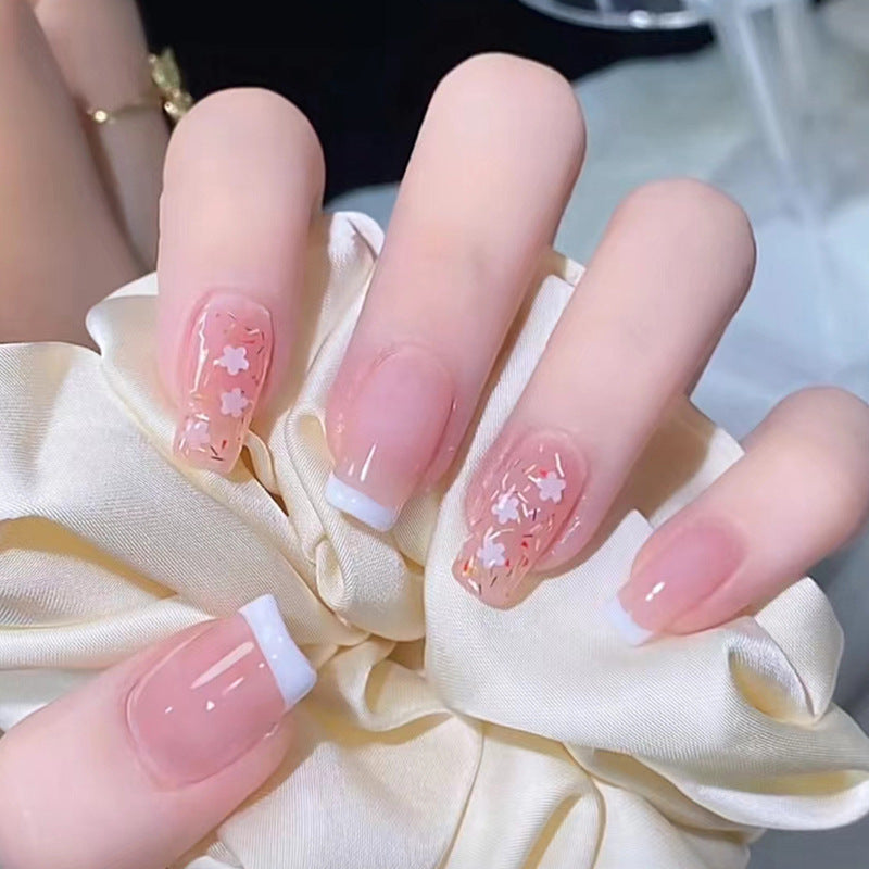 Nail art set with floral decorations and elegant French design Kalsten