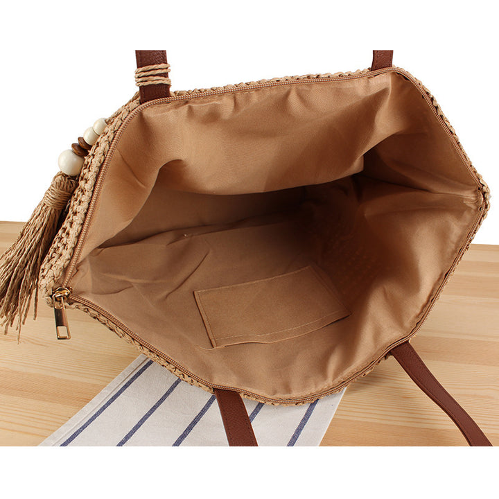 Handbag Made of Braided Natural Material with Tassel Decoration Kalsten