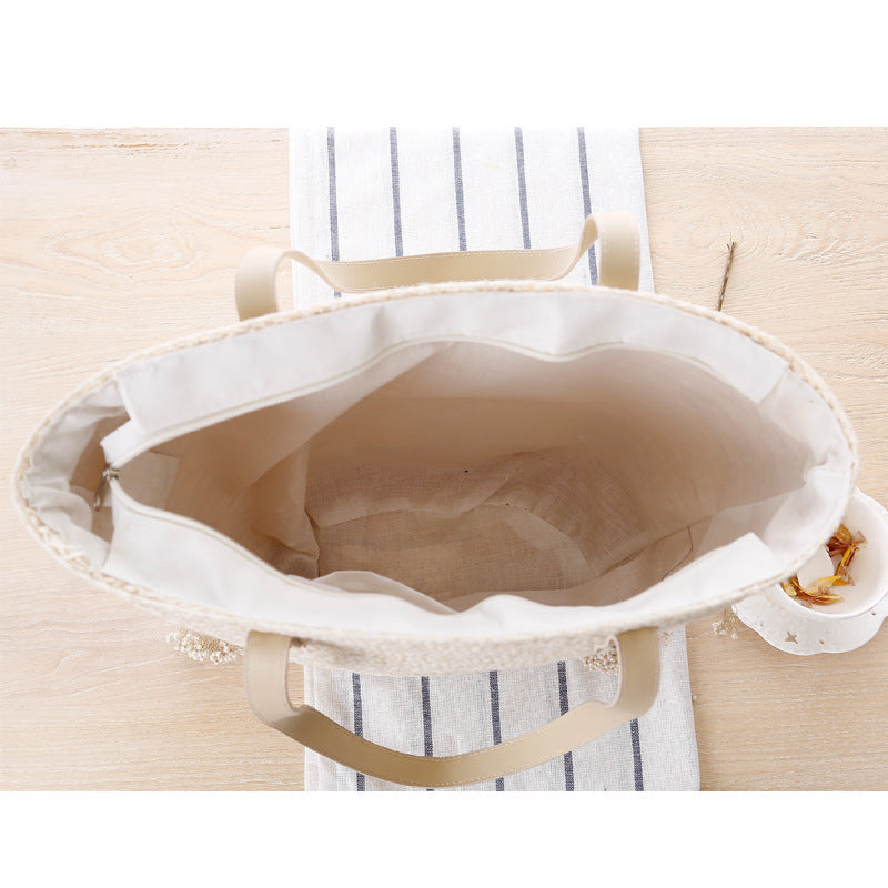 Straw bag with stylish knot closure Kalsten