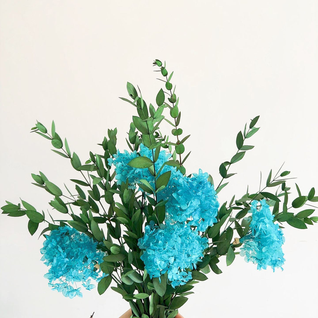 Lifelike Floral Bouquet with Green Foliage