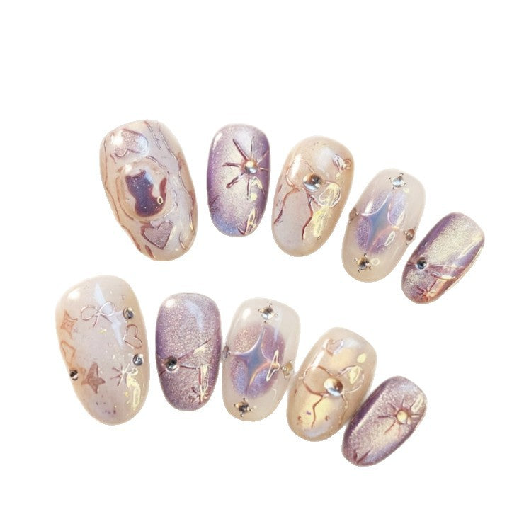 Artificial nails with playful bow and star design Kalsten