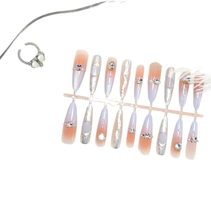 Artificial nails with elegant glitter design and fine 3D decorations Kalsten