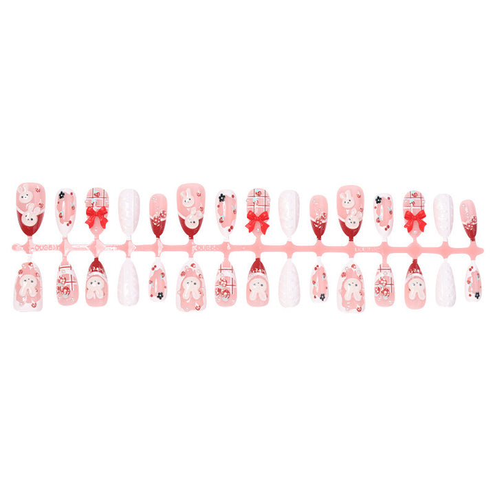 Creative acrylic nail set with playful bunny and gift designs Kalsten