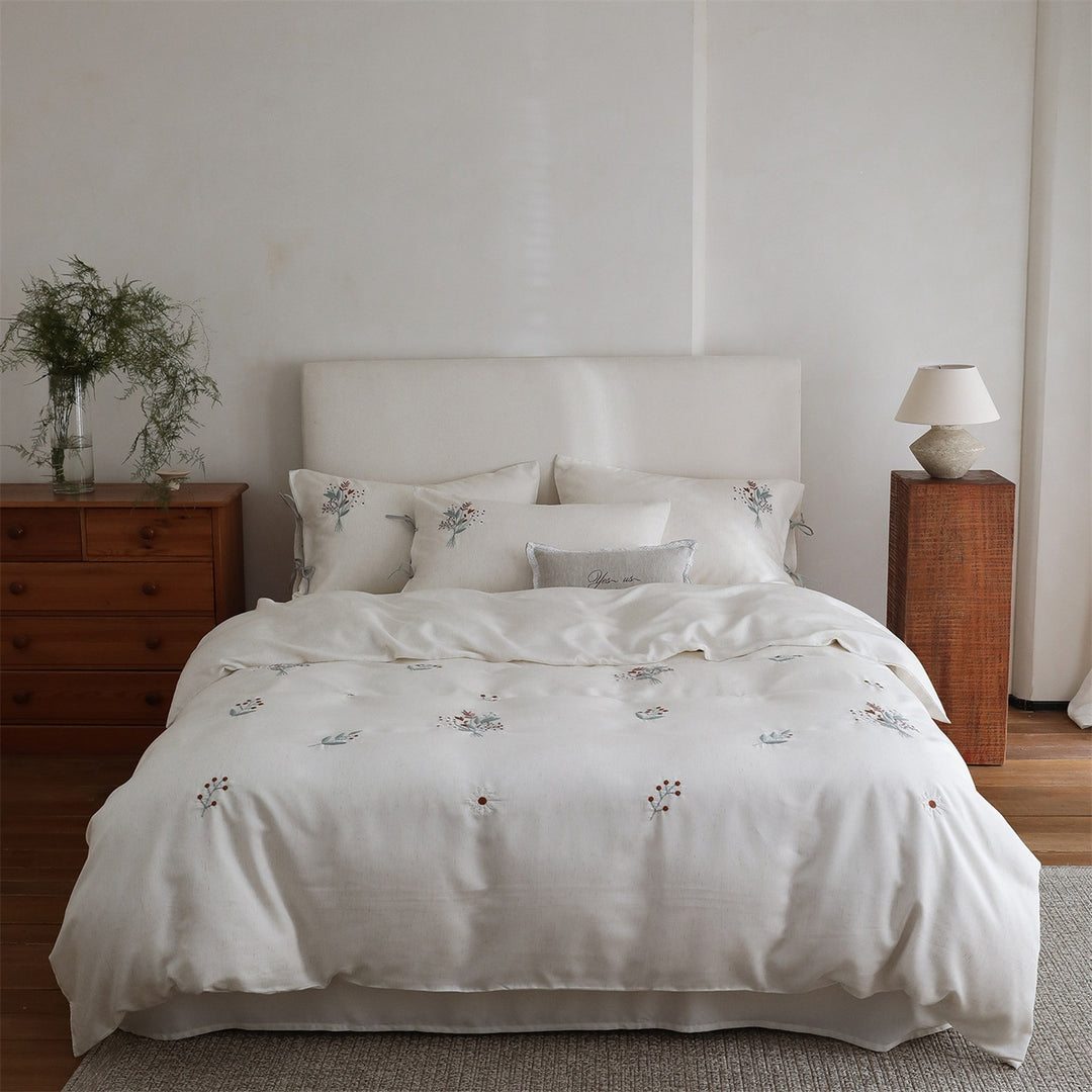 Embroidered cotton bedding set with bow pillowcases and dried flower embroidery