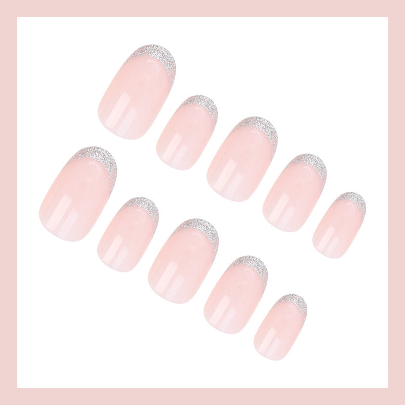 Acrylic nail set with elegant French tip and glitter accents Kalsten