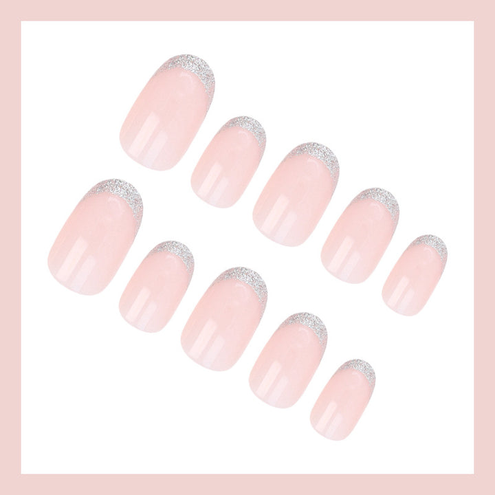 Acrylic nail set with elegant French tip and glitter accents Kalsten