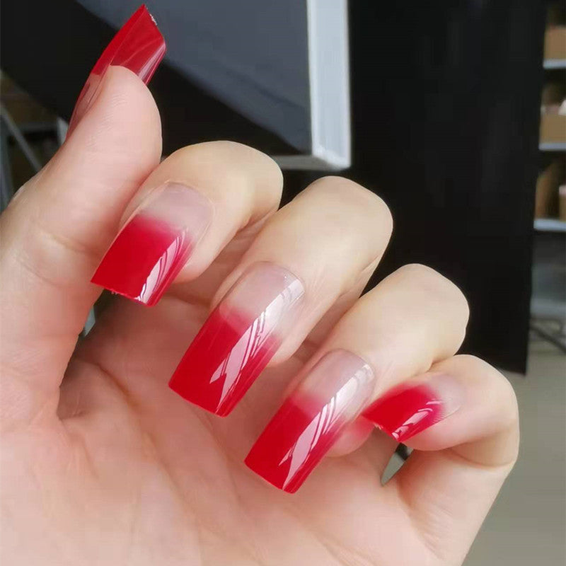 Artificial nails in modern French Tip design Kalsten