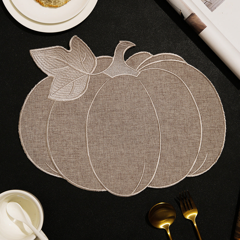 Pumpkin-shaped table set made of linen look with quilted contours and heat-resistant placemat