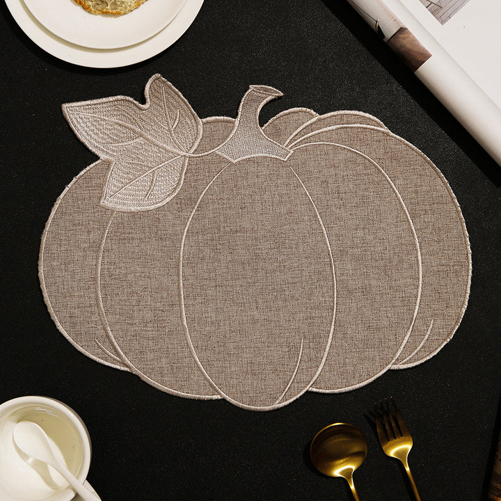 Pumpkin-shaped table set made of linen look with quilted contours and heat-resistant placemat