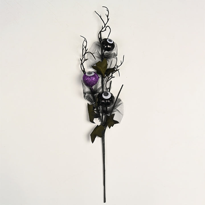 Creepy Halloween decoration with eyes and glitter