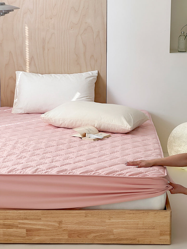 Quilted mattress topper with all-around elastic and breathable microfiber