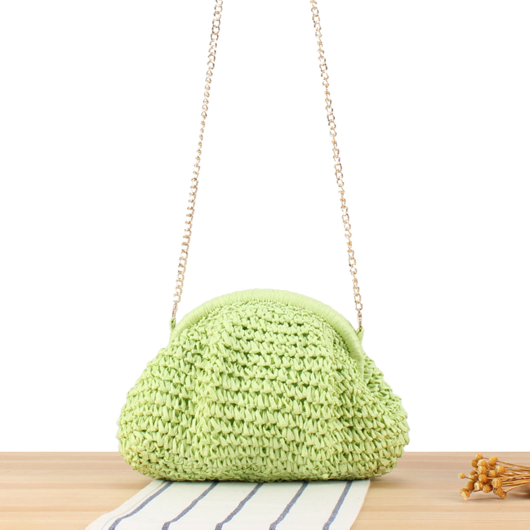 Shoulder bag made from handcrafted natural fibers with elegant chain decoration Kalsten