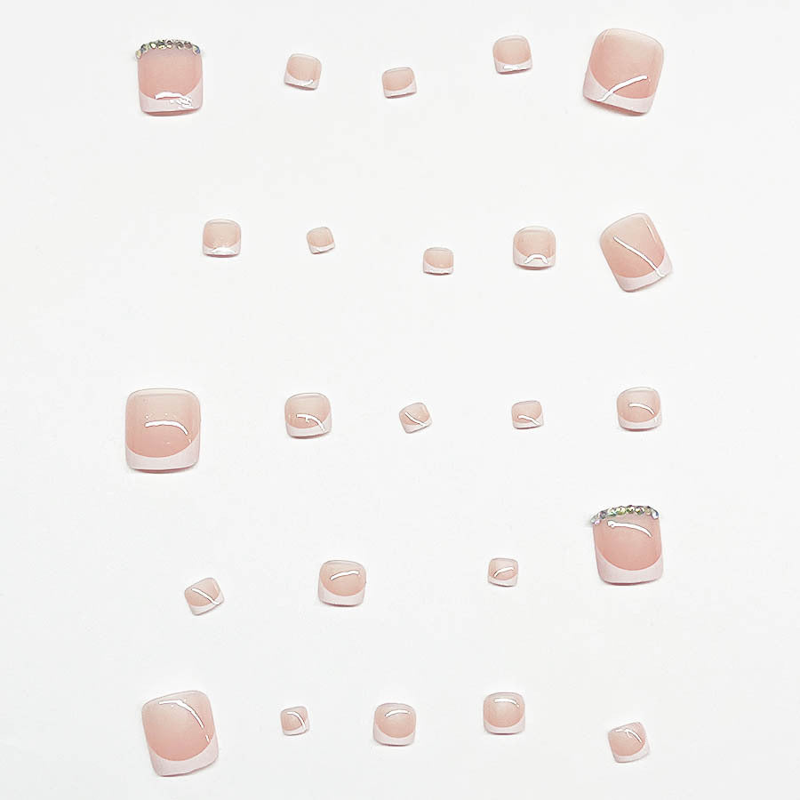 Nail art set with elegant French design and sparkling accents Kalsten