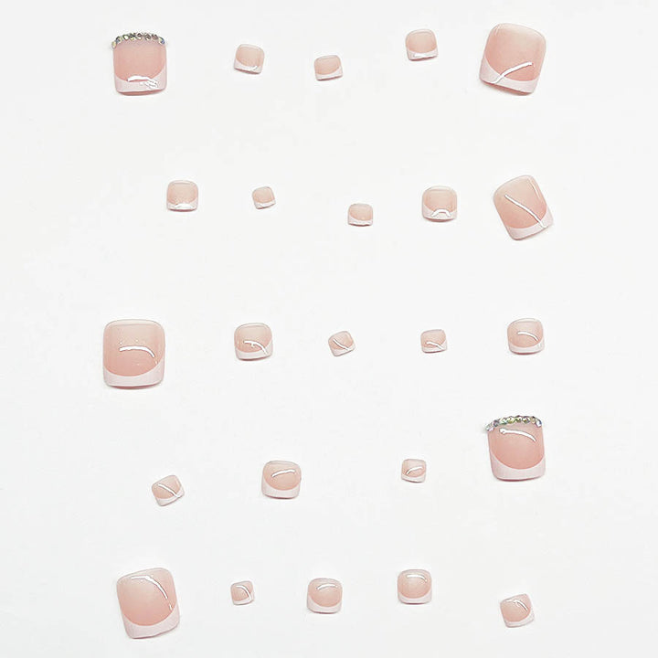 Nail art set with elegant French design and sparkling accents Kalsten