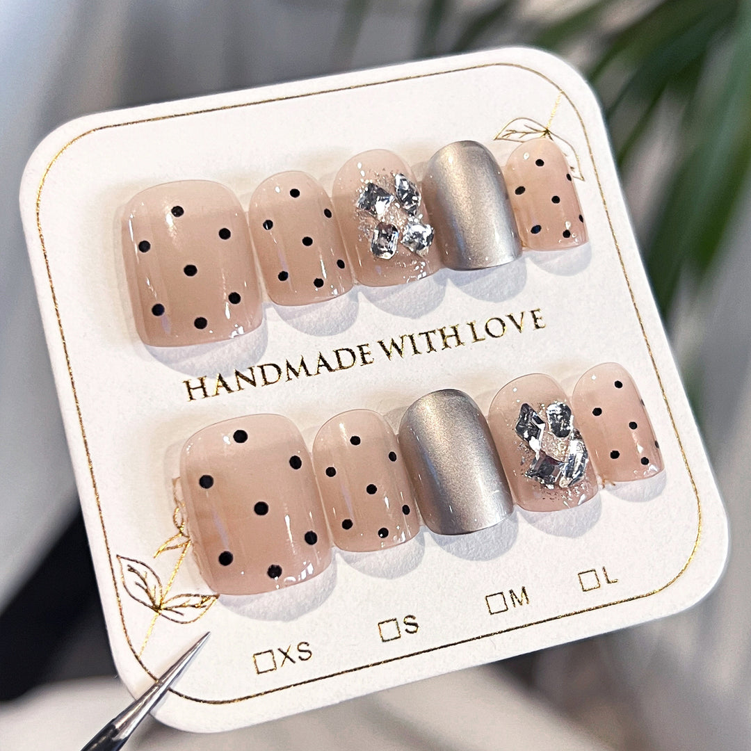 Artificial nail extensions with elegant accent decoration Kalsten