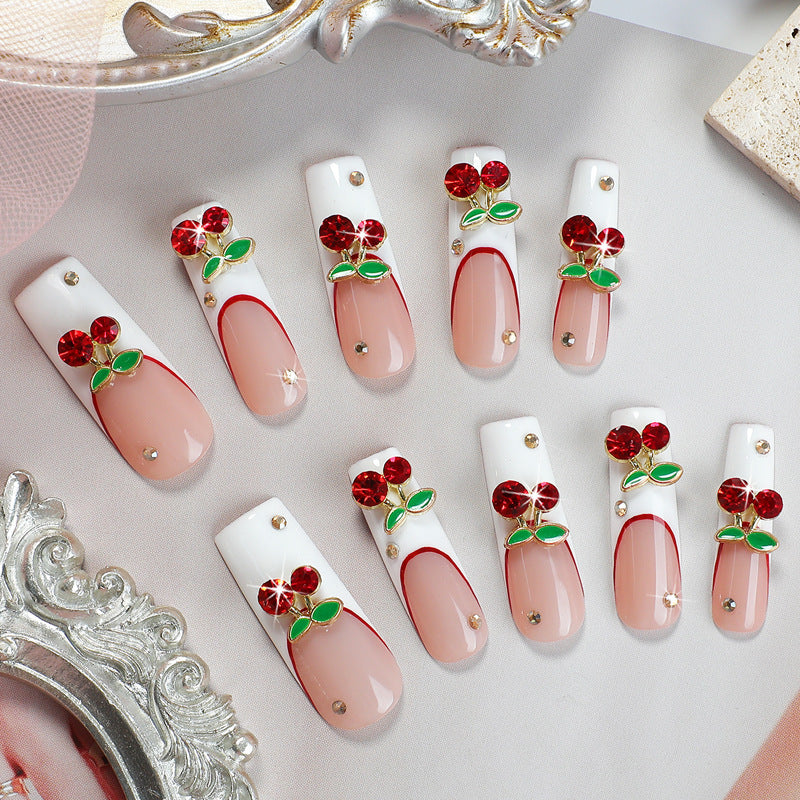 Artificial nail set with cherry motif and sparkling rhinestones Kalsten