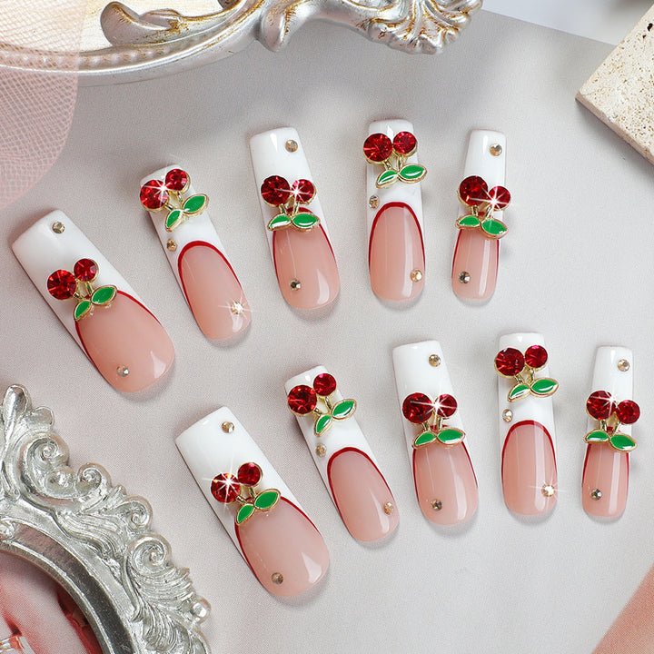 Artificial nail set with cherry motif and sparkling rhinestones Kalsten