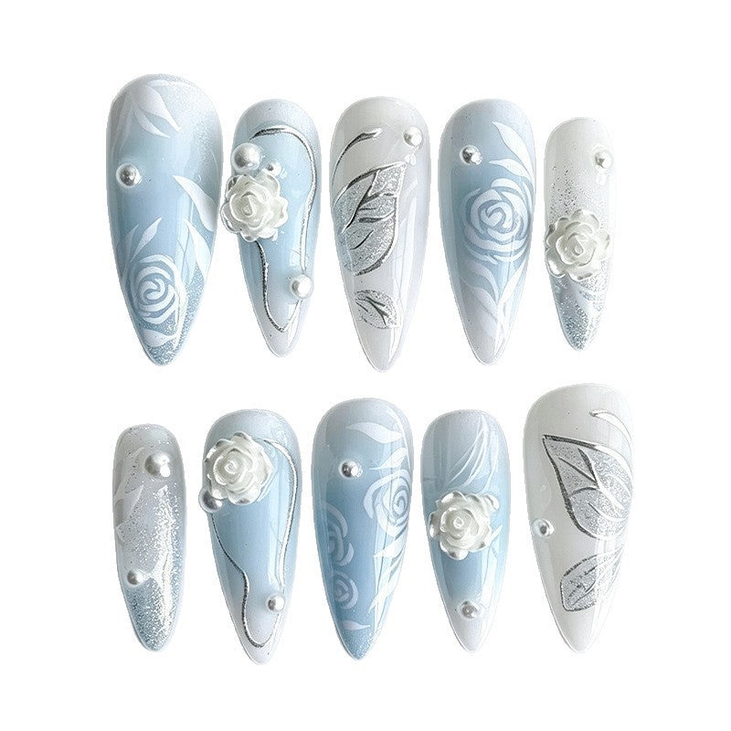 Artificial nail set with elegant floral motifs and glitter effects Kalsten