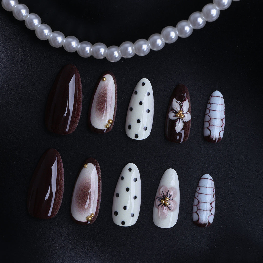Designer artificial nails with floral and geometric accents Kalsten